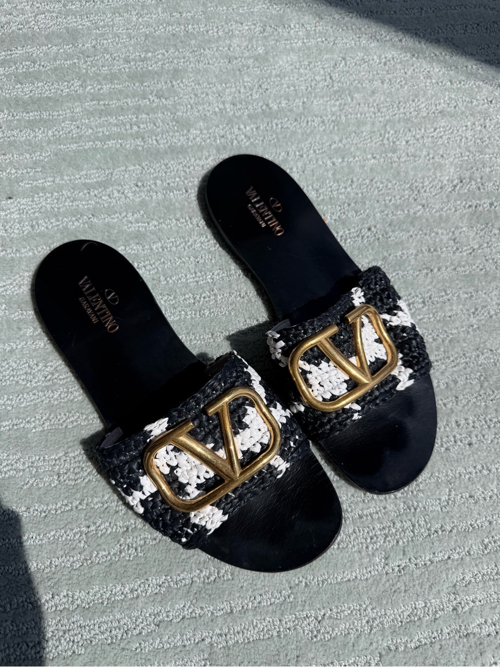Valentino Garavani Black and White Braided Slide Sandals with Gold V Logo